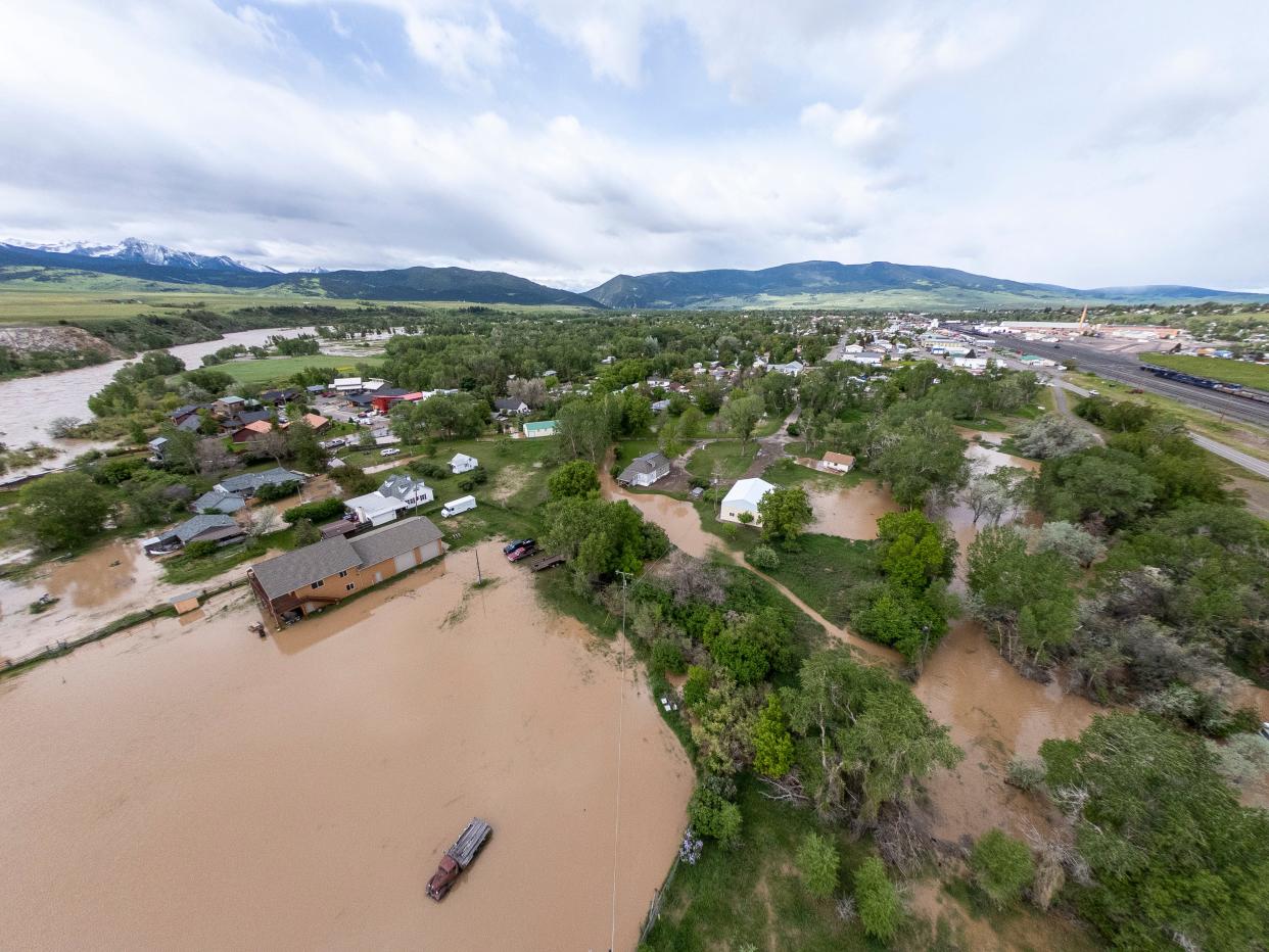 In this aerial view, flooding is seen on June 14, 2022 in Livingston, Montana. The Yellowstone River hit has a historic high flow from rain and snow melt from the mountains in and around Yellowstone National Park.