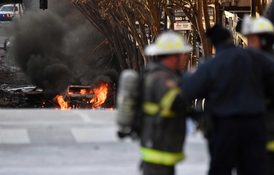 Dec 25, 2020; Nashville, TN, USA; A vehicle is on fire after an explosion in the area of Second and Commerce Friday, Dec. 25, 2020 in Nashville, Tenn. Mandatory Credit: Andrew Nelles-USA TODAY NETWORK/Sipa USA