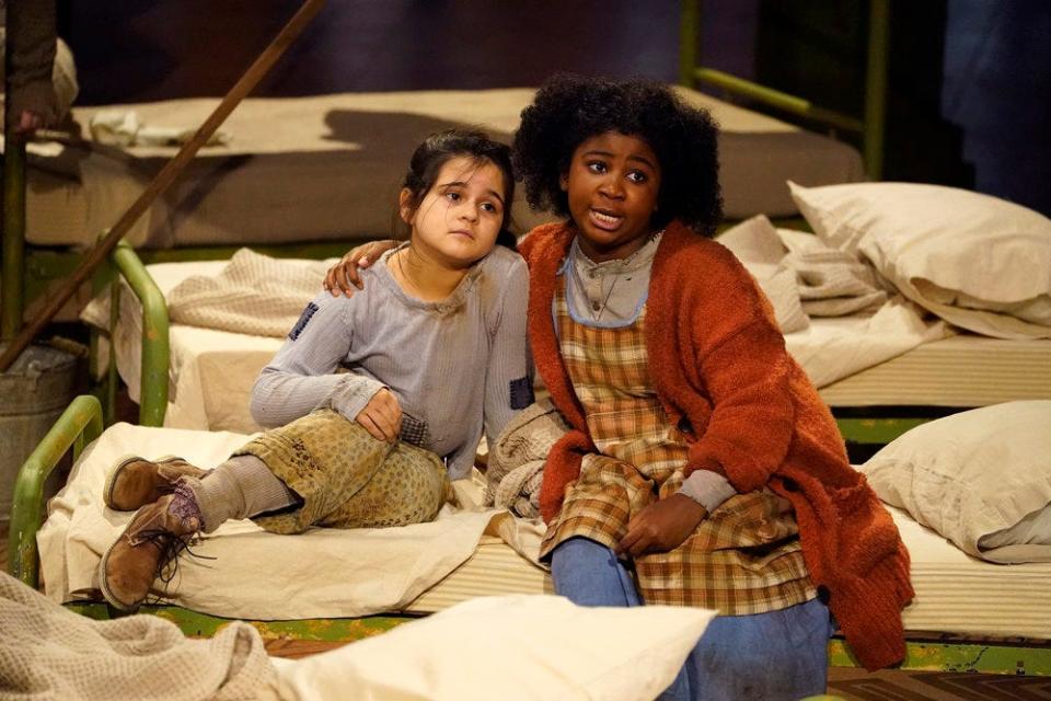 Annie (Celina Smith, right) comforts fellow orphan Molly (Felice Kakaletris) in "Annie Live!"