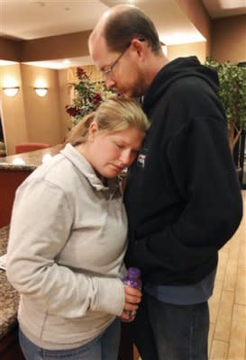 Deborah Bradley, left, and Jeremy Irwin in the lobby of a Kansas City hotel on October 7, 2011, three days after their 10-month-old daughter, Lisa, disappeared from their home. (Photo: Orlin Wagner/AP)