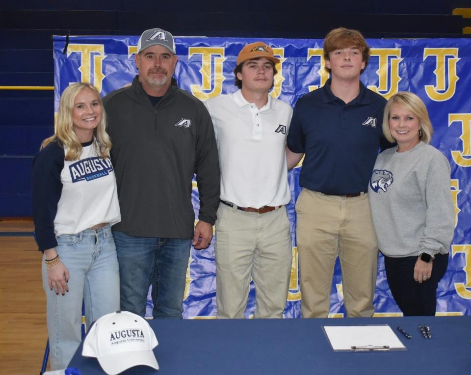 TJA senior Ty Cobb poses with his family during his recent signing day events.