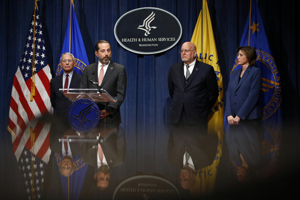 Health and Human Services Secretary Alex Azar speaks at a news conference about the federal government's response to a virus outbreak originating in China, Tuesday, Jan. 28, 2020, in Washington. Standing alongside Azar are National Institute of Allergy and Infectious Diseases Director Anthony Fauci, from left, Centers for Disease Control and Prevention Director Robert Redfield and National Center for Immunization and Respiratory Disease Director Nancy Messonnier. (AP Photo/Patrick Semansky)