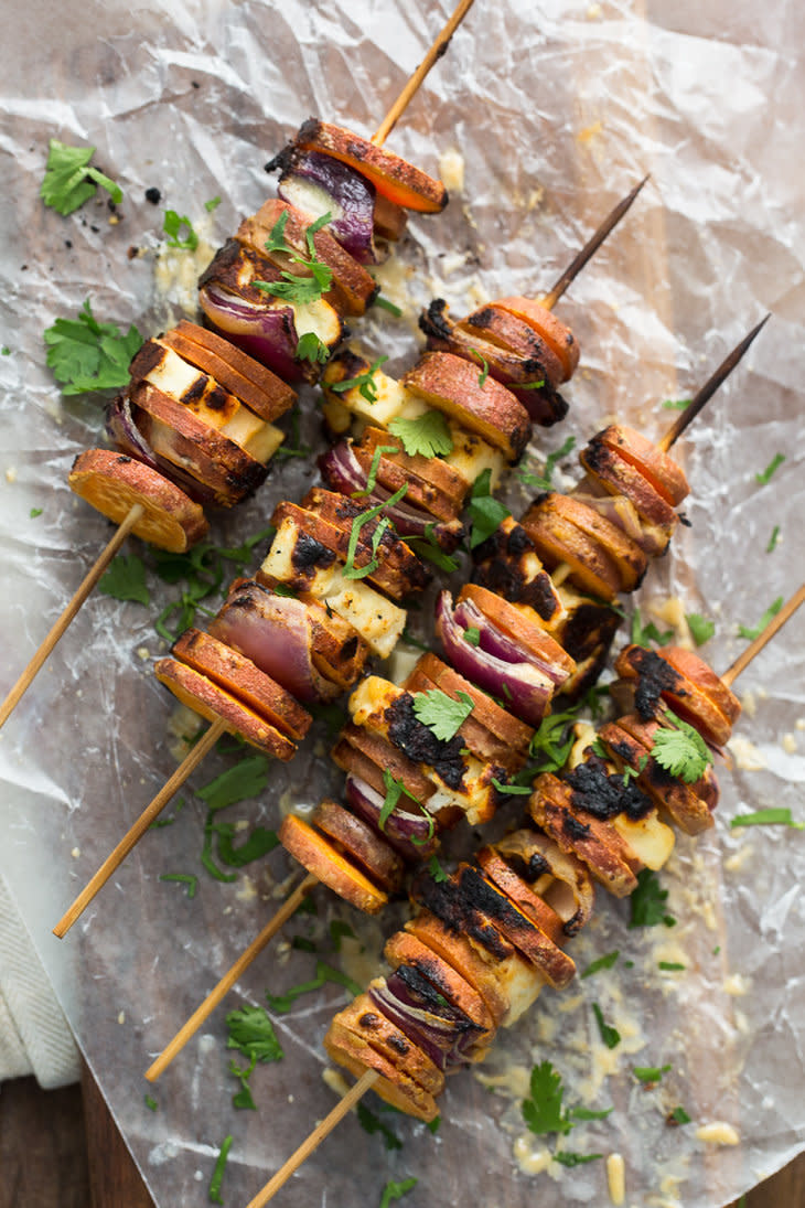 <strong>Get the <a href="http://naturallyella.com/2015/04/09/grilled-sriracha-tahini-sweet-potato-skewers-with-halloumi/" target="_blank">Grilled Sriracha-Tahini Sweet Potato Skewers with Halloumi recipe</a> from Naturally Ella</strong>