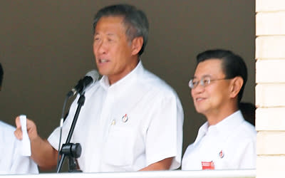 Minister Ng Eng Hen (left) will be Minister for Defence, while Minister Wong Kan Seng (right) will be retiring. (Yahoo! photo/Henry Lim)