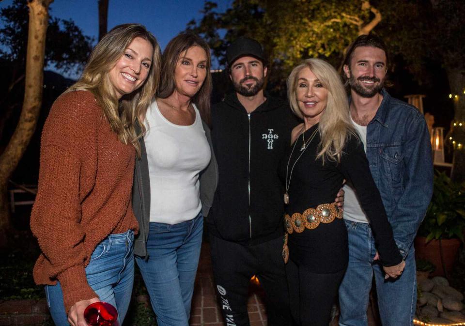 Cassandra Marino, Caitlyn Jenner, Brody Jenner, Linda Thompson and Brandon Jenner pose for a portrait at Brandon Jenner's Interactive Party, Live Show And Video Premiere For His New Single "Death Of Me" on May 11, 2019 in Malibu, California