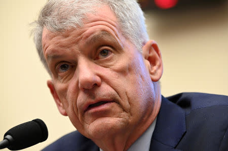 FILE PHOTO: Former Wells Fargo CEO Tim Sloan, pictured on March 12 in Washington, quit the bank at the end of last month. REUTERS/Erin Scott/File Photo