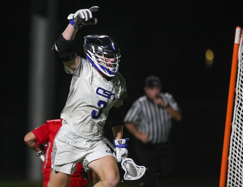 Community School of Naples Seahawks attacker Ramsey Huggins (3) celebrates a goal during the third quarter of the Class 1A Region 3 semifinal against the Cardinal Mooney Cougars at Community School of Naples on Wednesday, April 26, 2023.