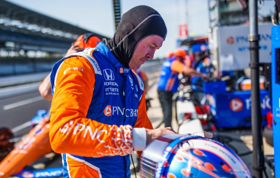 Chip Ganassi Racing driver Scott Dixon (9) takes off his helmet Friday, May 20, 2022, during Fast Friday at Indianapolis Motor Speedway. 