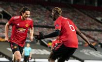 Edinson Cavani, left, celebrates his second goal with Paul Pogba