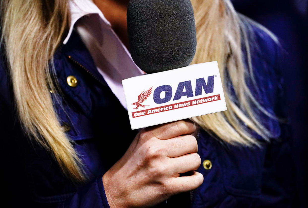 One America News Network microphone Drew Angerer/Getty Images