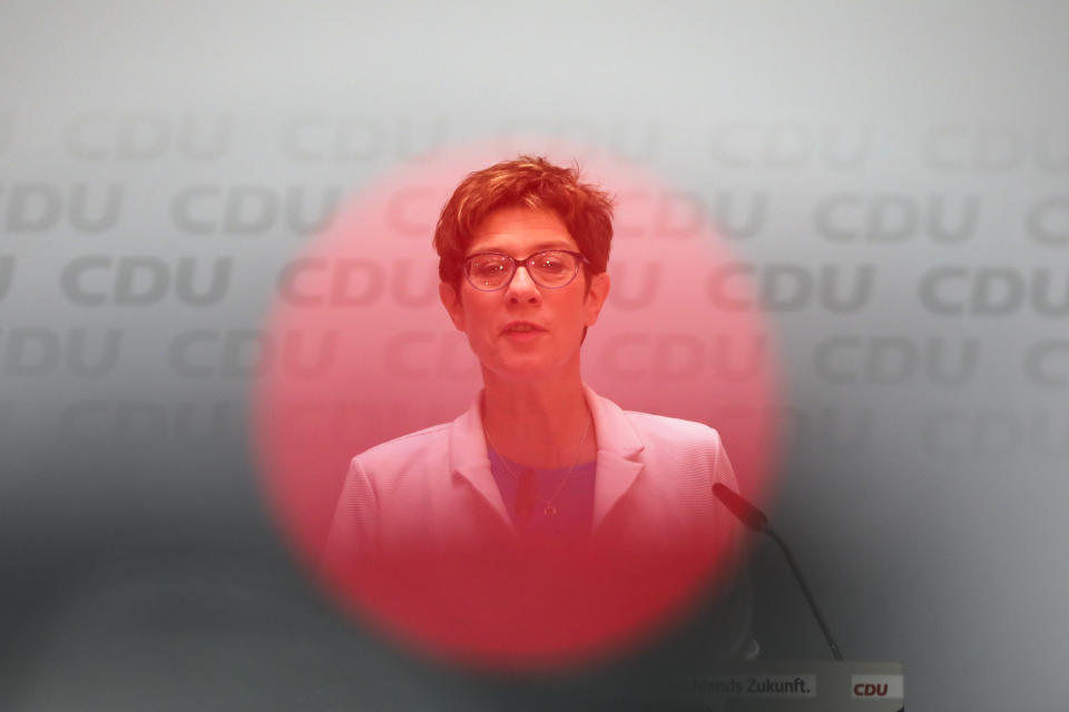 In this picture Taken with a television camera control light in the foreground German Christian Democratic Union party chairwoman Annegret Kramp-Karrenbauer attends a news conference after a board meeting at the party's headquarters in Berlin, Monday, May 27, 2019. Germany's governing parties slid to their worst post-World War II showing in a nationwide election at the European Parliament elections yesterday. Chancellor Angele Merkel's center-right Union bloc drops down from 35.4 to 28.9 percents. (AP Photo/Markus Schreiber)