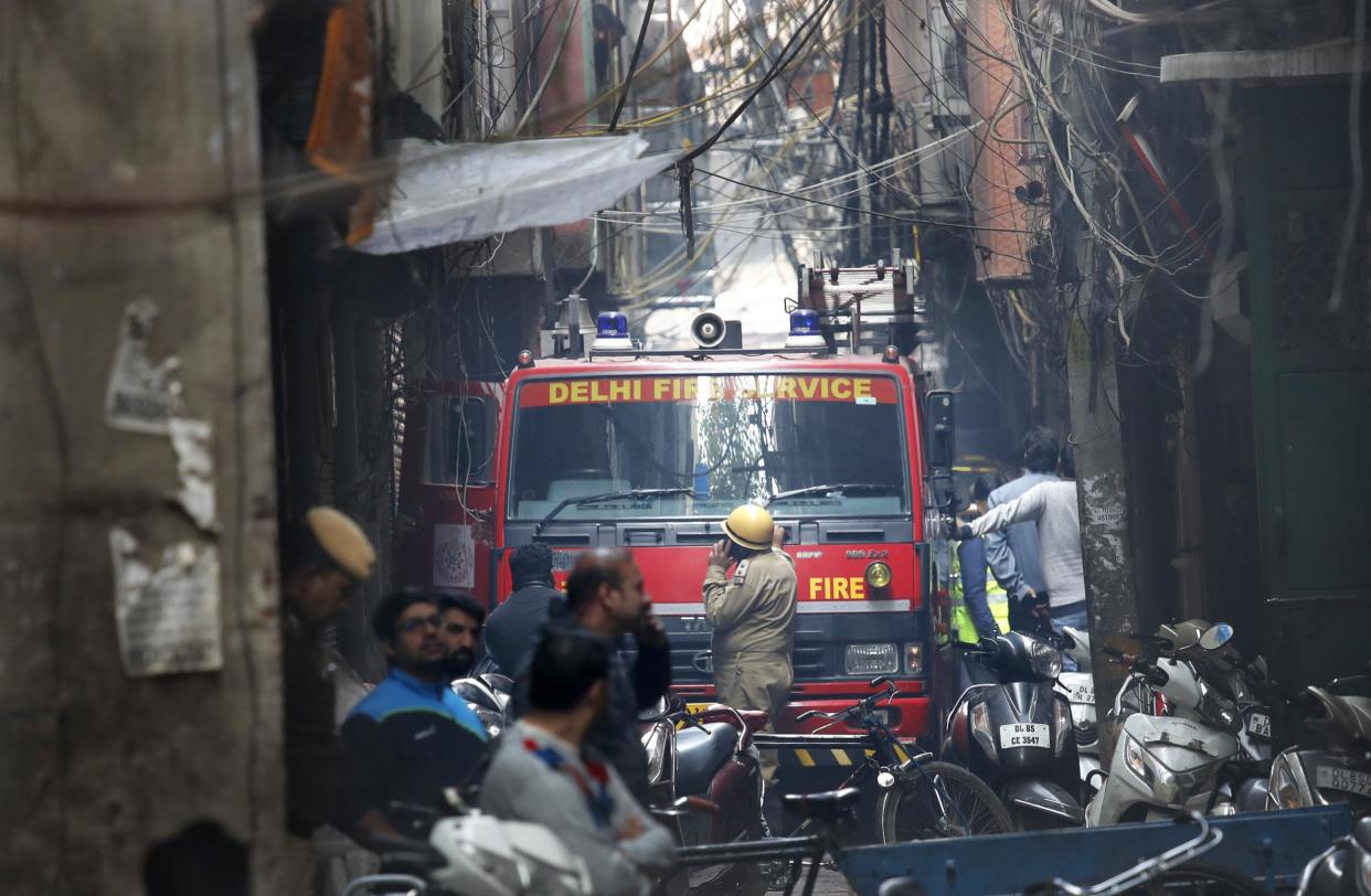 A fire engine outside a factory that suffered a blaze: AP