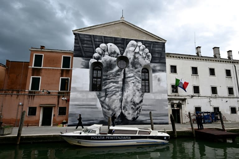 A mural by artist Maurizio Cattelan at the Giudecca Women's Prison for the Venice Biennale (GABRIEL BOUYS)