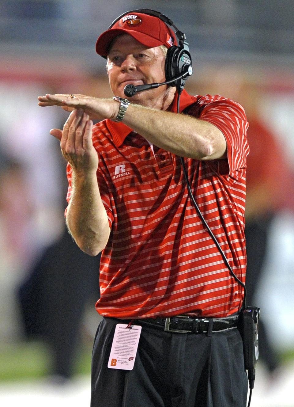 Western Kentucky head coach Bobby Petrino calls for a timeout against South Alabama during the fourth quarter of an NCAA college football game in Mobile, Ala. Things haven't gone as well as Petrino had hoped in his coaching return with Western Kentucky. The Hilltoppers are 4-4 and out of Sun Belt contention, needing to win out just to have an outside chance for a second straight bowl bid. ( 