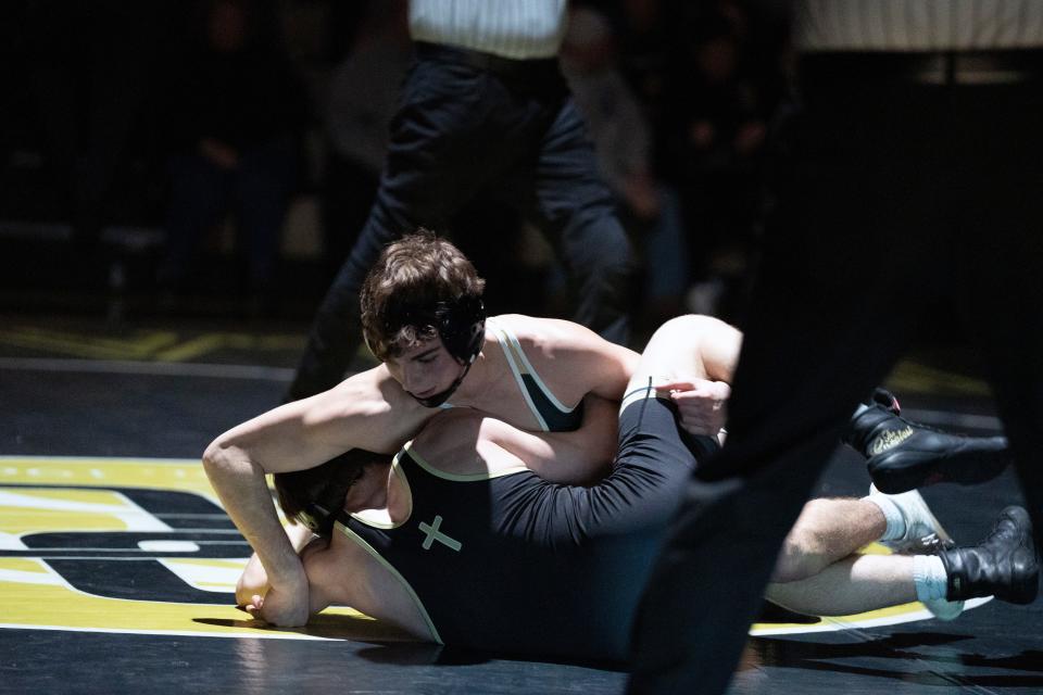 St. Joseph wrestling at Paramus Catholic on Wednesday, January 18, 2023. Mateo Sgambellone, of St. Joseph, on his way to defeating Patrick Quinn, of Paramus Catholic, in their 138 pound match. 