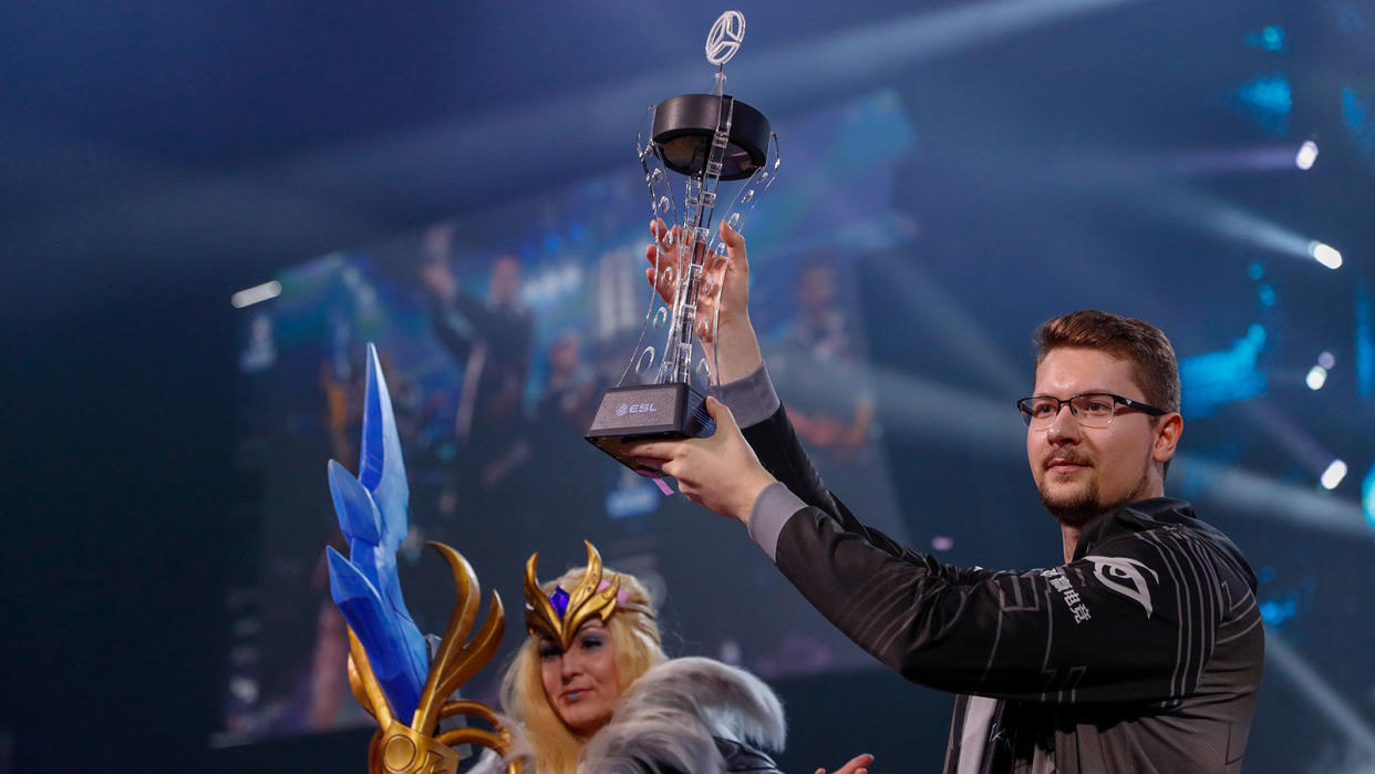 Team Secret's Puppey lifts a trophy. (Photo: Getty Images)