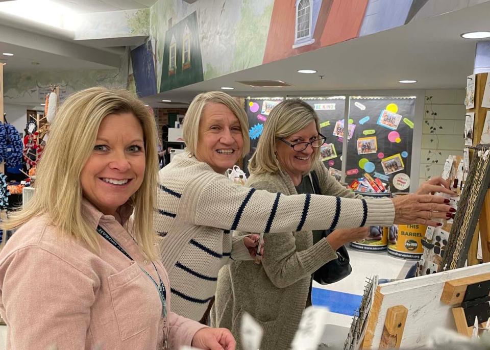 Beth Johnson, Becky Nagle and Kim Keily shop for handmade presents.