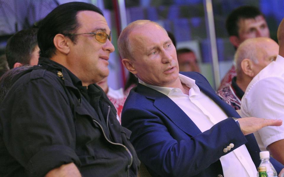 Steven Seagal and Vladimir Putin in 2012 - AFP