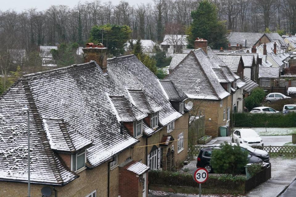 Snow covered rooftops in the village of Detling, Kent (PA)