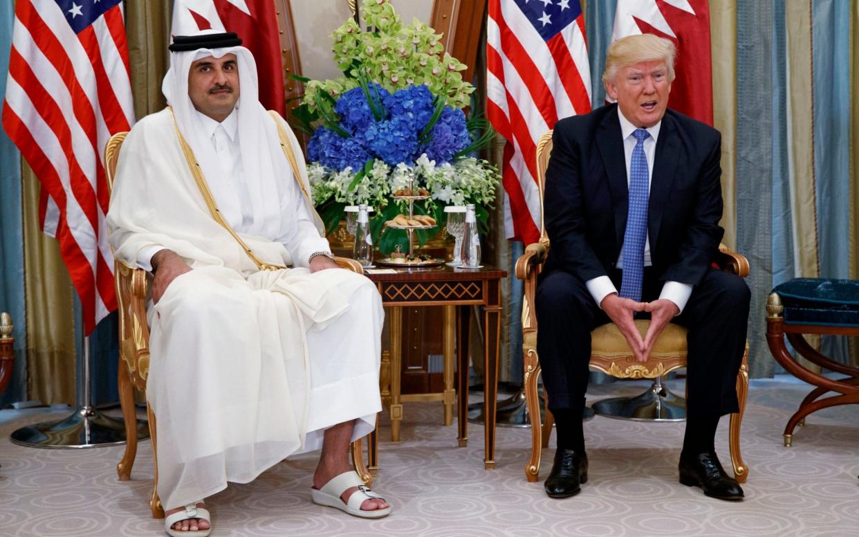  President Donald Trump, right, holds a bilateral meeting with Qatar's Emir Sheikh Tamim Bin Hamad Al-Thani, in Riyadh - AP