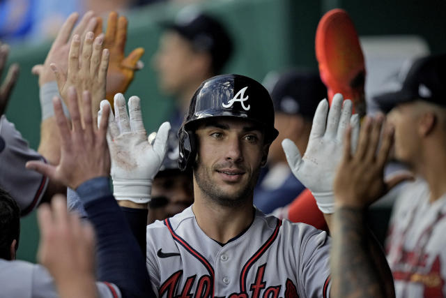 Matt Olson of the Atlanta Braves walks into the dugout before the in  2023