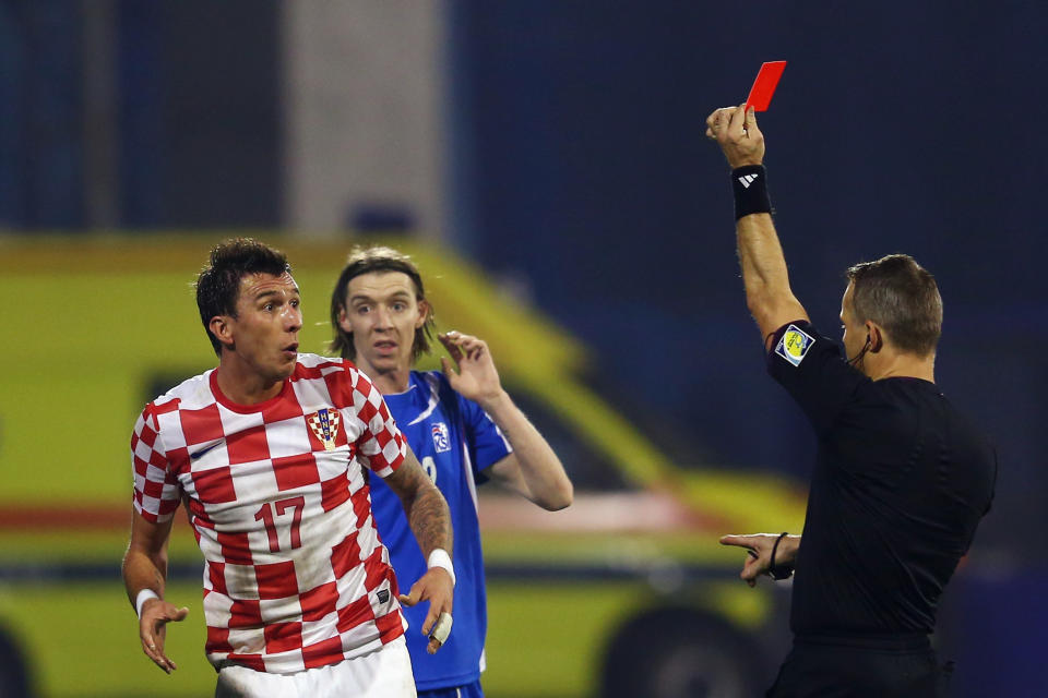 Soccer’s red and yellow card system is one of many quirky and subjective parts of the laws of the game. (Getty)