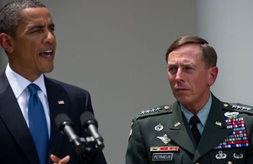 US Gen. David Petraeus (R) listens to President Barack Obama announce him as the successor of US commander in Afghanistan General Stanley McChrystal in Washington, DC in 2010. As Obama moved to draw down US forces from Afghanistan, Petraeus moved to the CIA last year at a time when the agency was involved in a drone war against insurgents in Pakistan and Yemen