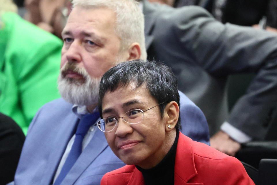 Nobel Peace Prize winners 2021 Dmitry Muratov and Maria Ressa attend a ceremony for World Press Freedom day at the Graduate Institute in Geneva, Switzerland May 3, 2022. REUTERS/Denis Balibouse