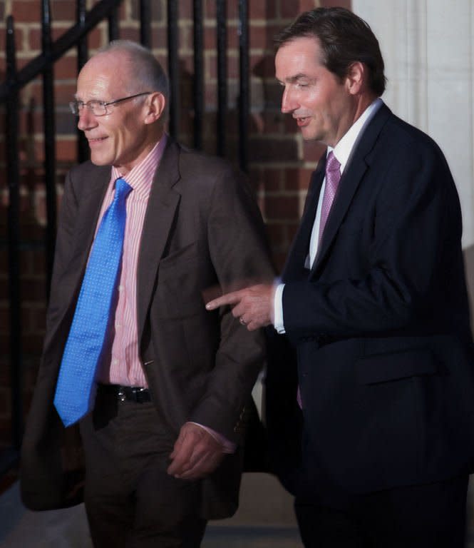 Surgeon-gynaecologists Alan Farthing and Marcus Setchell (L) who delivered the baby leave the Lindo Wing of Saint Mary's Hospital in Paddington, west London on July 22, 2013