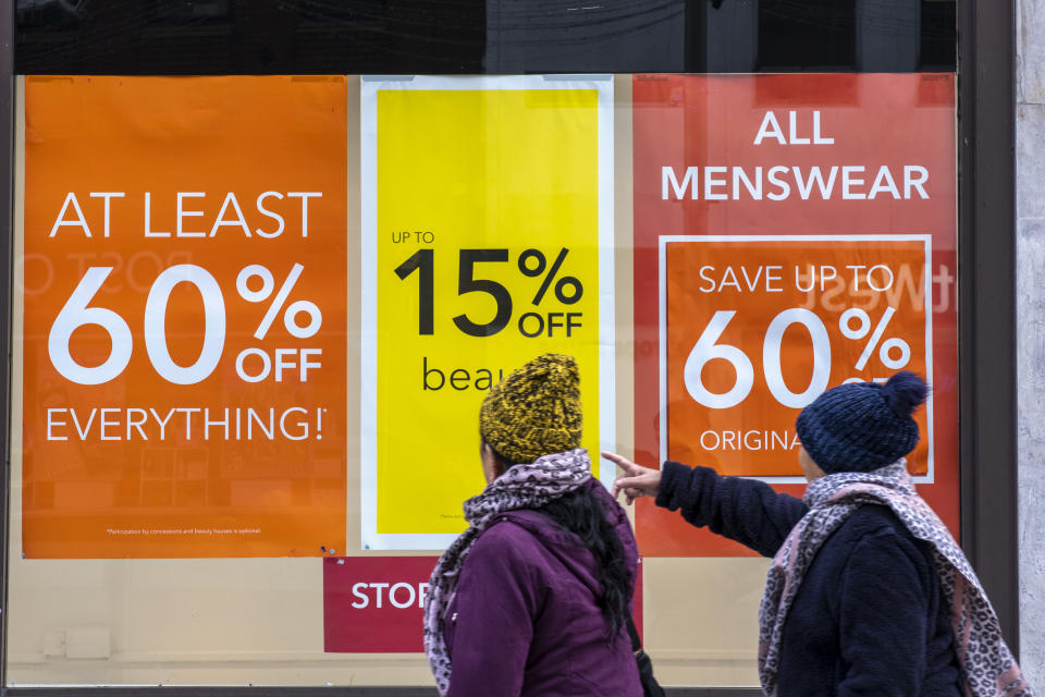 People walking past the sale signs outside the Folkestone Debenhams store in the final few days of the Everything Must Go sale before closing down on 13th Jauary 2020 in Folkestone, Kent. United Kingdom. The company announced the closure of 19 stores across the UK after going into administration in 2019.  (photo by Andrew Aitchison / In pictures via Getty Images)