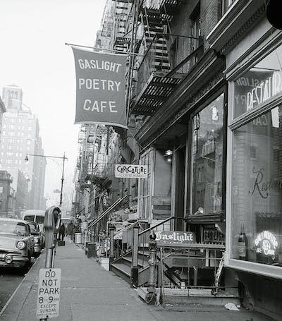 Dylan performed at New York City’s Gaslight Cafe, a popular folk music venue. <a href="https://www.gettyimages.co.uk/detail/news-photo/new-york-ny-gaslight-poetry-cafe-116-mcdougal-st-daily-news-photo/514678712?adppopup=true" rel="nofollow noopener" target="_blank" data-ylk="slk:Bettmann/Getty Images;elm:context_link;itc:0;sec:content-canvas" class="link ">Bettmann/Getty Images</a>