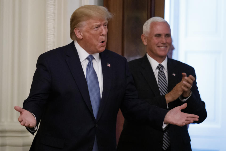 President Donald Trump, and Vice President Mike Pence arrive to at the Young Black Leadership Summit at the White House in Washington, Friday, Oct. 4, 2019. (AP Photo/Carolyn Kaster)