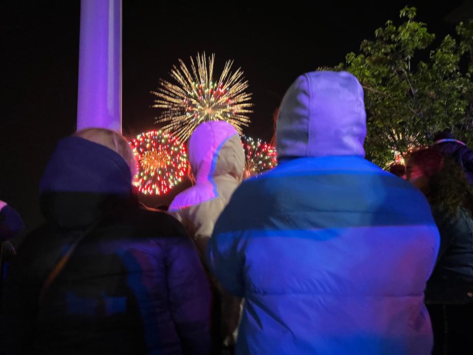 Kim Broyles and her daughters Presley and Lincoln enjoy the fireworks at the Galt House.