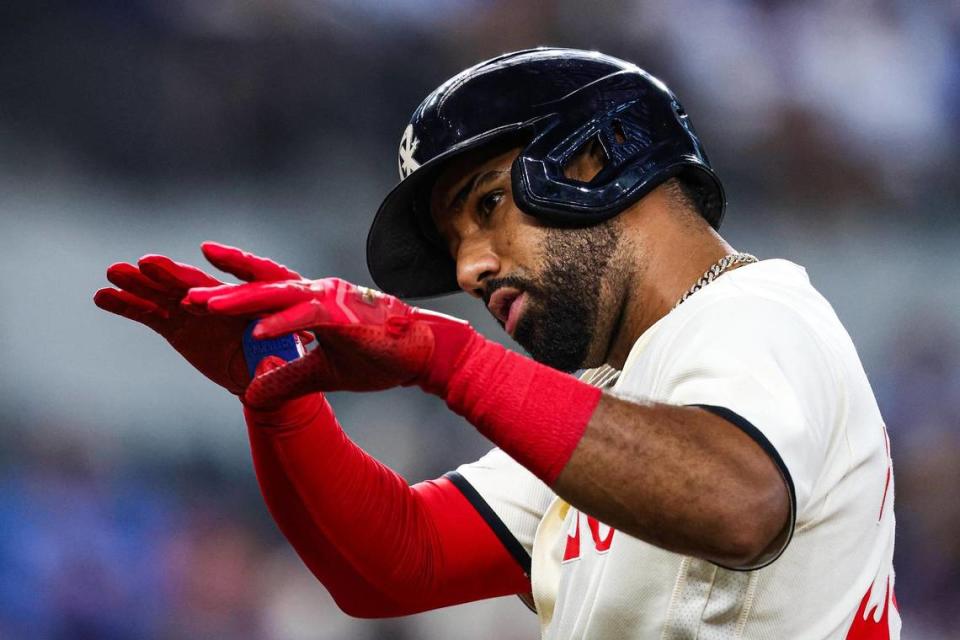 Texas Rangers infielder Ezequiel Duran (20) gestures to the dugout after hitting a single in the seventh inning of a regular season match up against the Los Angeles Dodgers at Globe Life Field in Arlington, Texas on Saturday, July 22, 2023. The Rangers gave up 18 hits losing 16-3.