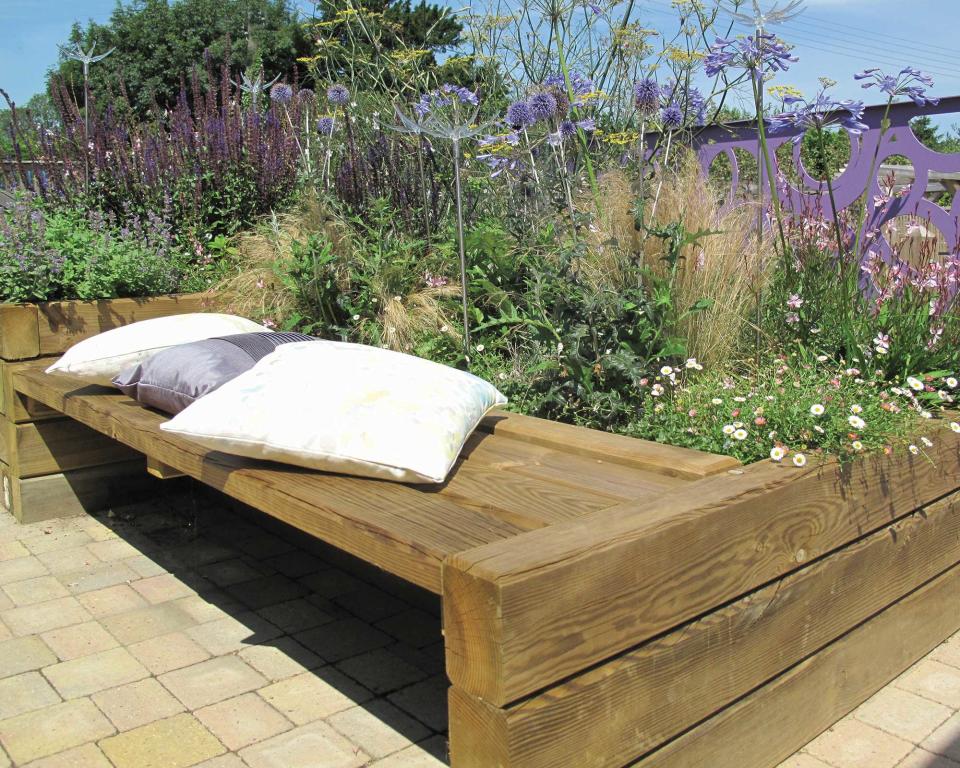 9. Use garden sleepers for raised beds, benches, and more