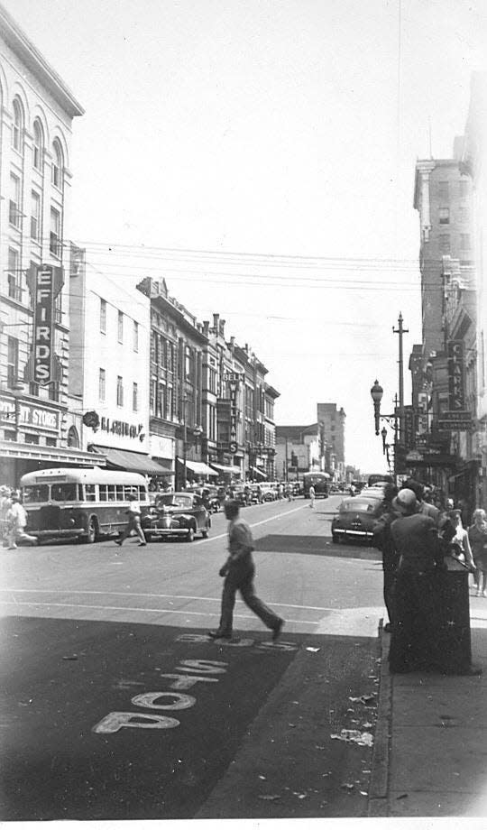 1942 photograph taken looking south up Front Street from the northwest corner of Grace Street. Efirds and Belk Williams stores can be seen at left.