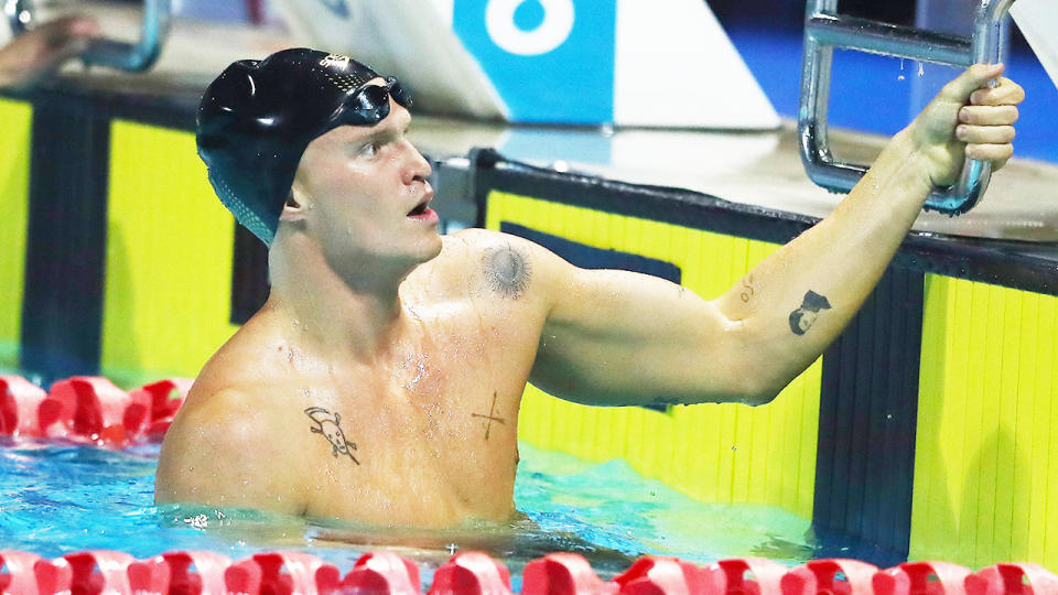 Seen here, Cody Simpson reflects on his race at the Australian Swimming Championships. 