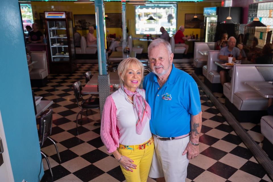 Ellie's 50's Diner co-owners Ellie and Bob Smela pose for a portrait in the main dining area of their Delray Beach restaurant on June 28. After 32 years in business, Delray Beach staple Ellie's 50's Diner will close its doors on July 10.