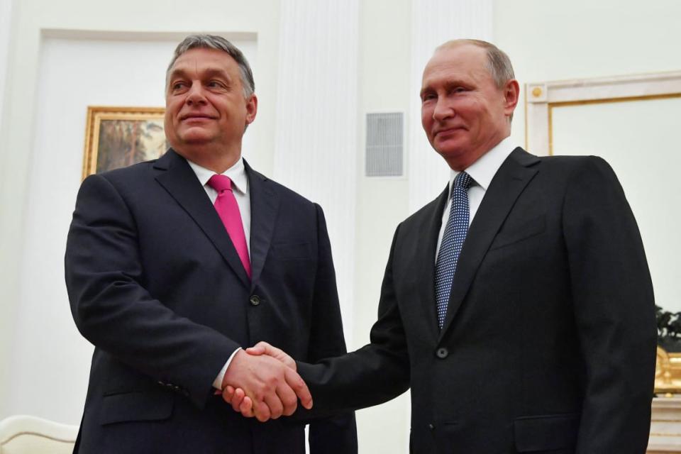<div class="inline-image__caption"><p>Russian President Vladimir Putin (R) shakes hands with Hungary’s Prime Minister Viktor Orban during a meeting at the Kremlin in Moscow on July 15, 2018. </p></div> <div class="inline-image__credit">Yuri Kadobnov/AFP via Getty Images</div>