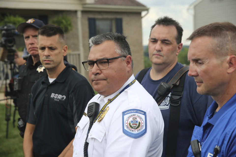 Steve Imbarlina, Assistant Chief of Allegheny County EMS, briefs the media on Saturday, Aug. 12, 2023, after a house explosion at the intersection of Rustic Ridge and Brookside drives in Plum, Pa. (Kyle Nelson/Pittsburgh Post-Gazette via AP)