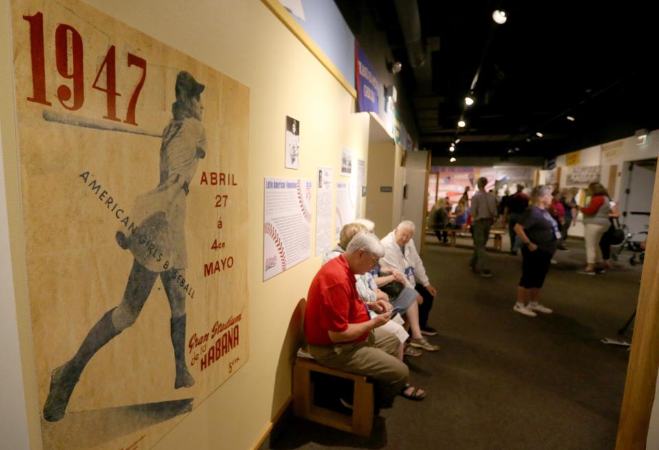Memorabilia lines the walls of an exhibit for the All-American Girls Professional Baseball League on Aug. 19, 2022, at The History Museum in South Bend, Indiana.