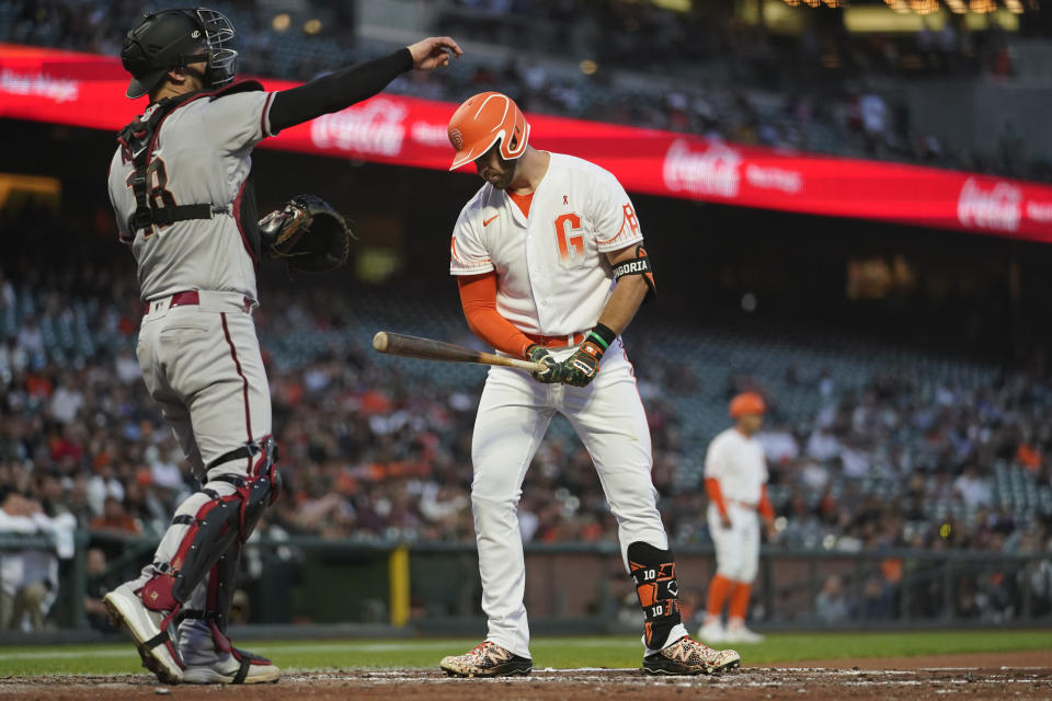 San Francisco Giants' Evan Longoria turns away after striking out against the Arizona Diamondbacks during the fourth inning of a baseball game in San Francisco, Tuesday, Aug. 16, 2022. (AP Photo/Godofredo A. Vásquez)