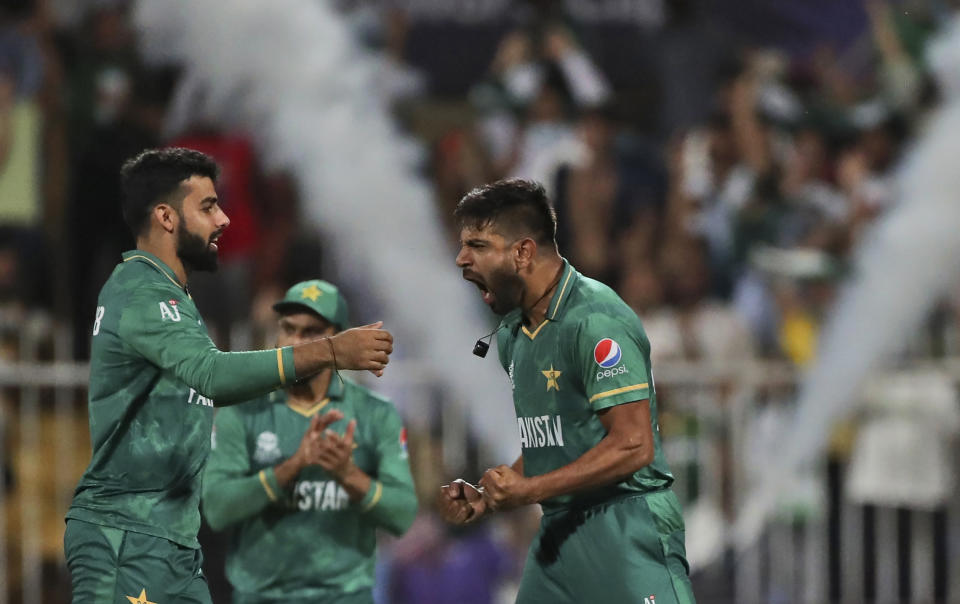 Pakistan's Haris Rauf celebrates the dismissal of New Zealand's Martin Guptill during the Cricket Twenty20 World Cup match between New Zealand and Pakistan in Sharjah, UAE, Tuesday, Oct. 26, 2021. (AP Photo/Aijaz Rahi)