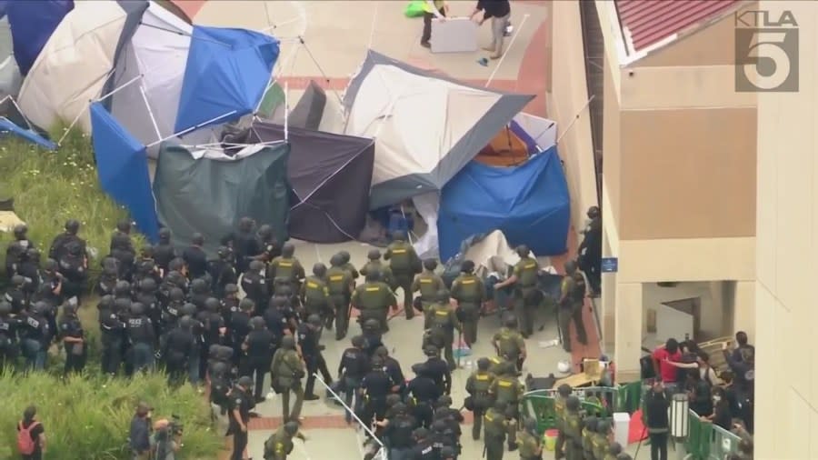Officers began dismantling a pro-Palestinian encampment at UC Irvine on May 15, 2024. (KTLA)