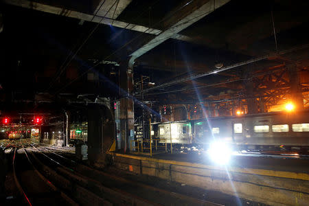 Commuter trains travel inside New York's Penn Station, the nation's busiest train hub, on a section of a complex of tracks that Amtrak says they will begin repairing over the summer in New York City, U.S., May 25, 2017. REUTERS/Mike Segar