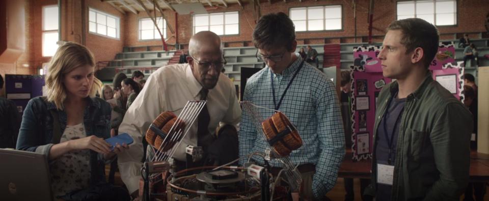 From left: Kate Mara as Sue Storm, Reg E. Cathey as Dr. Franklin Storm, Miles Teller as Reed Richards, and Jamie Bell as Ben Grimm in "Fantastic Four."