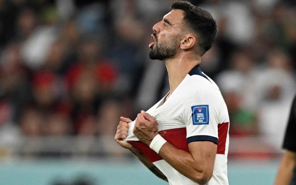 Portugal's midfielder #08 Bruno Fernandes reacts after missing a goal opportunity during the Qatar 2022 World Cup quarter-final - AFP