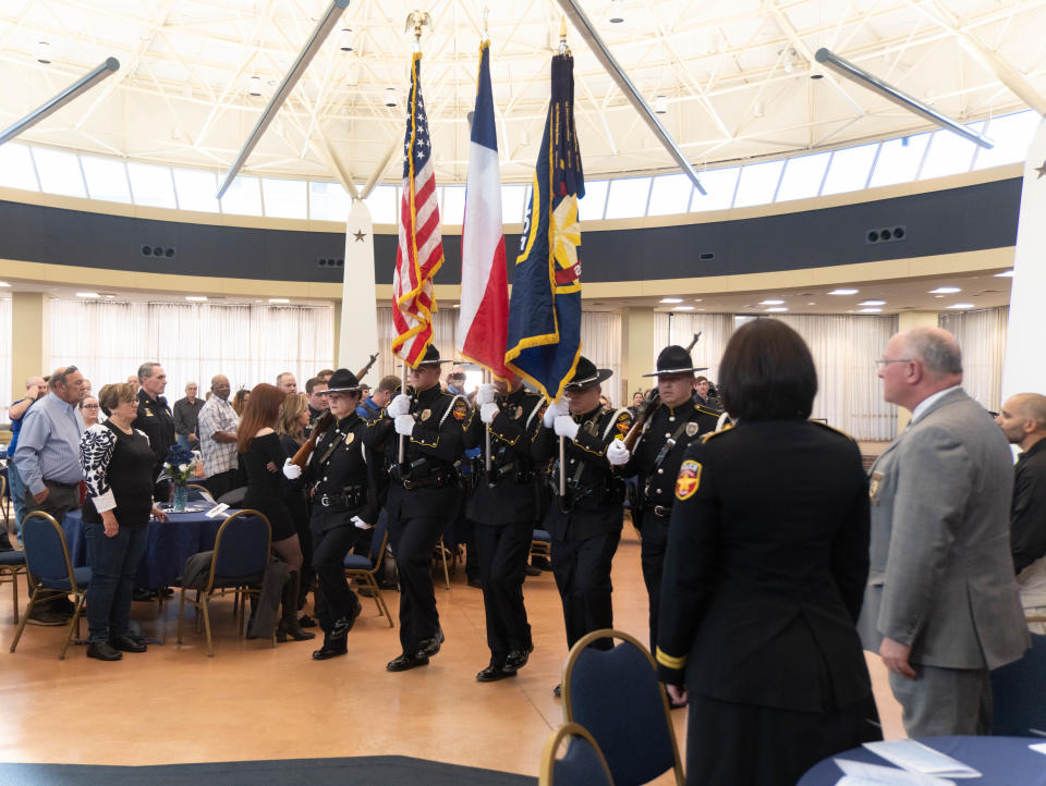 The Amarillo Police Honor Guard march with the colors at the 101st Amarillo Police Academy Graduation Thursday at the Amarillo Civic Center.