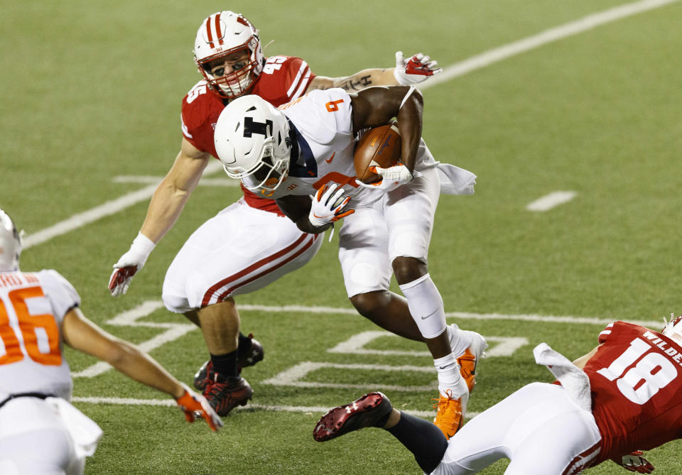 Illinois WR Josh Imatorbhebhe (9) couldn't get on track against Wisconsin on Friday night. (Jeff Hanisch-USA TODAY Sports)