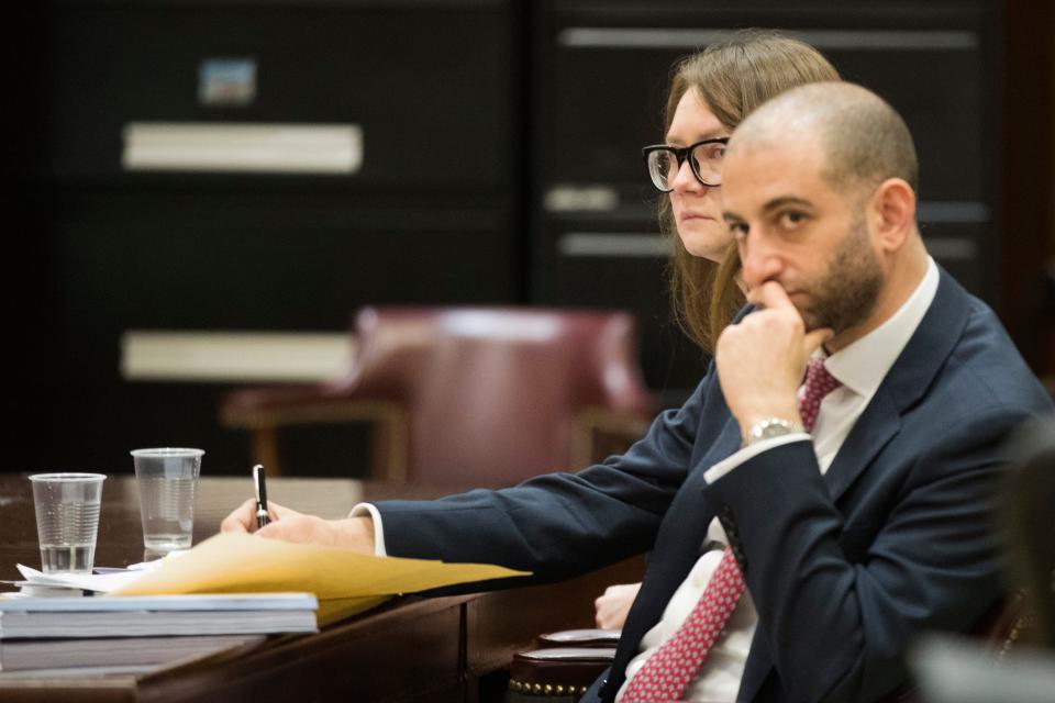 Anna Sorokin, right, and her lawyer Todd Spodek listens as the jury foreman reads the verdict, Thursday, April 25, 2019, in New York. A Manhattan jury has convicted fake German heiress Sorokin of swindling tens of thousands of dollars from banks, hotels and friends. Jurors returned a guilty verdict following a more than three-week trial that attracted international attention